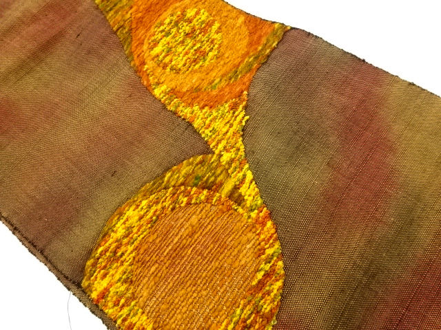 手織り紬紐通し抽象模様織出し名古屋帯